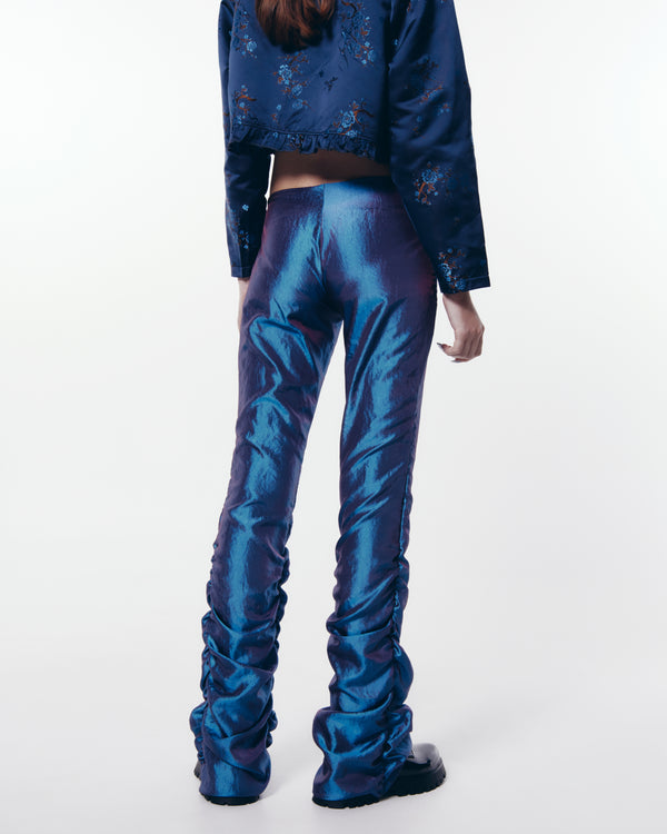 Iris iridescent trousers.